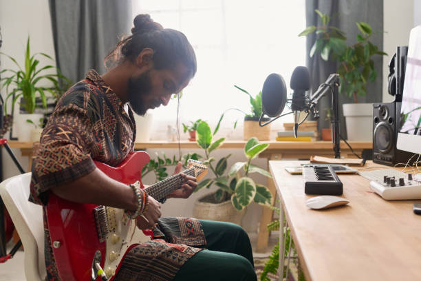 istock Talented man playing electric guitar 2150358445