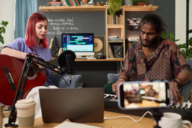 Musicians making livestream in studio