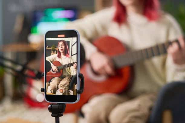 istock Screen of smartphone with musician 2150358491