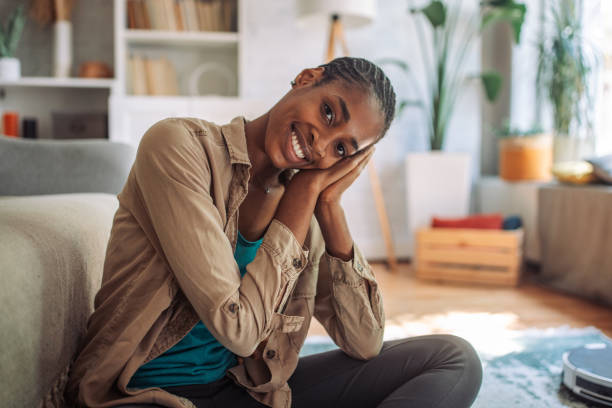 istock Casual young woman in home interior 2150360481