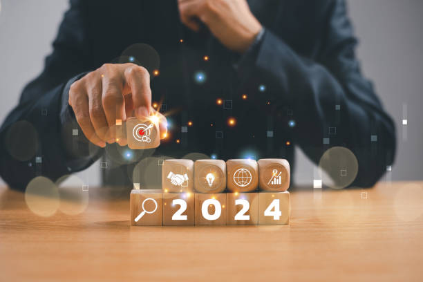 istock Start 2024 plan concept. Businessman show target icon action, target business trend strategy. Goal challenge person planning growth New year 2024, digital marketing, profit income. Finance investment 2150364151