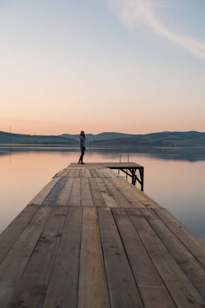 istock Woman on the pier 2150364168