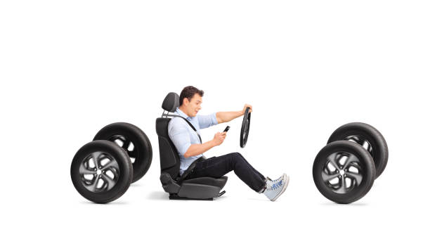 istock Man driving and looking at a smartphone 2150364779