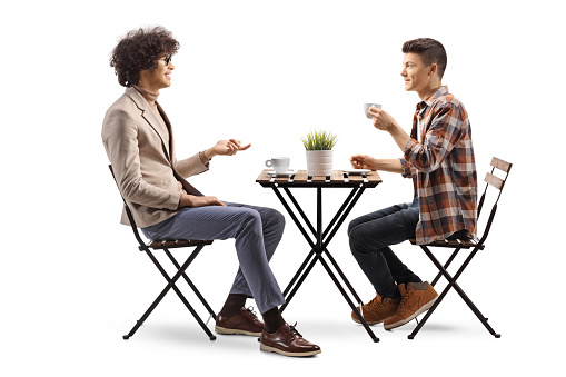 Guys in a cafe sitting and talking isolated on white background