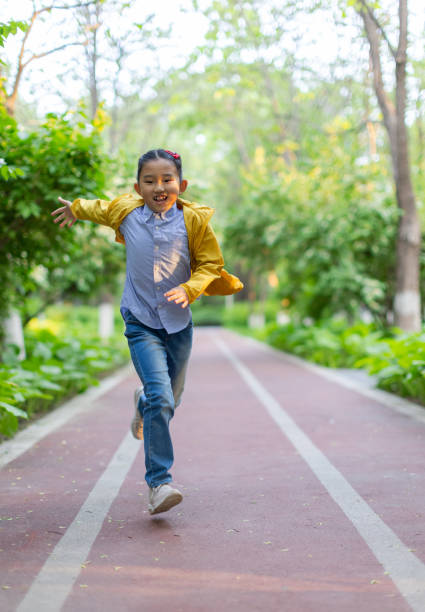 istock Asian Little Girl Running 2150364832