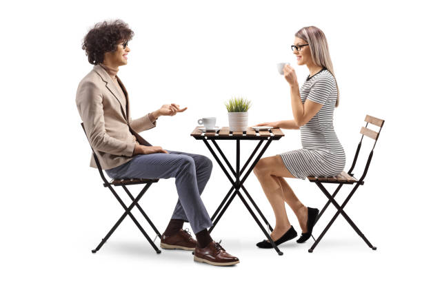 istock Young man and woman having coffee and talking 2150365173