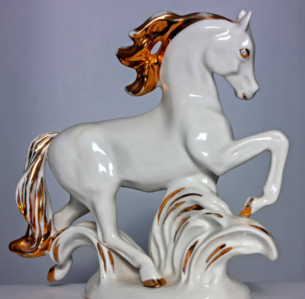 istock Porcelain horse on grey background. 2150365544