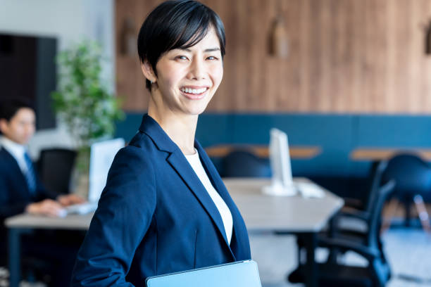 istock business woman working in the office 2150366074