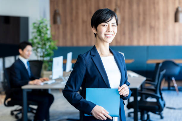 istock business woman working in the office 2150366079