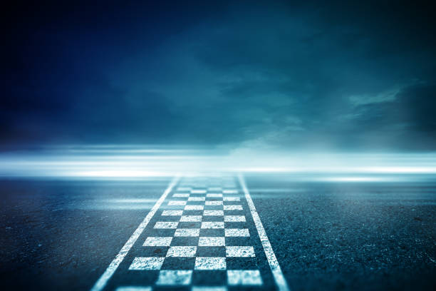 Abstract Race track finish line racing on light night