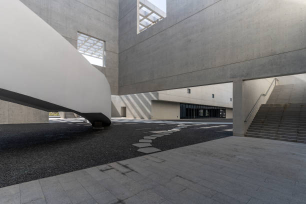 istock The cement rough wall of a simple and atmospheric building 2150371901