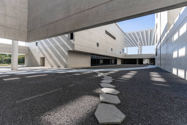 The cement rough wall of a simple and atmospheric building