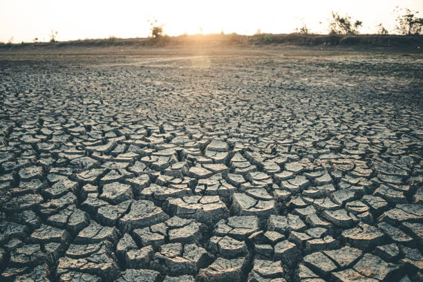 istock Landscape ground cracks drought crisis environment background. 2150372306