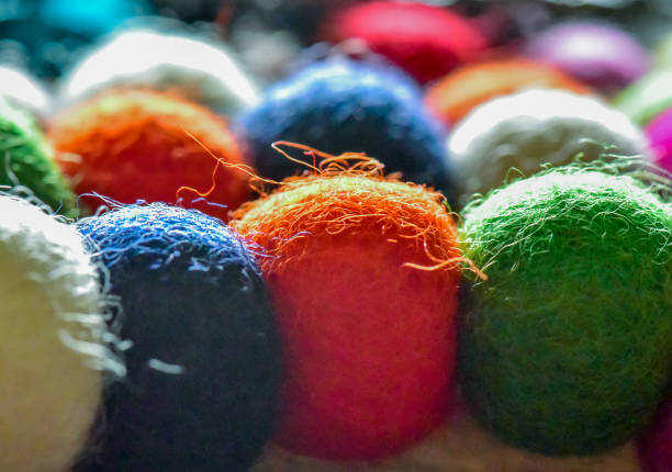 zoomed in photo of colorful round felt garland