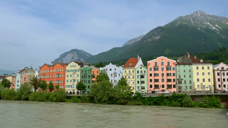 Colourful Houses on Mariahilf Street along the Inn River on cloudy, Innsbruck, Austria