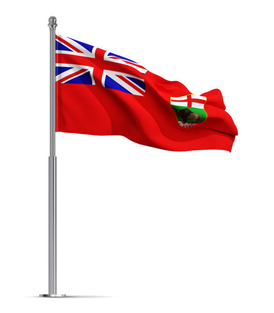Canadian flag in flowerbed with flowering plants and warm golden sunlight