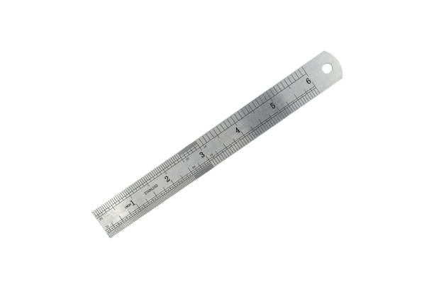 Metal steel ruler is isolated on white background.
