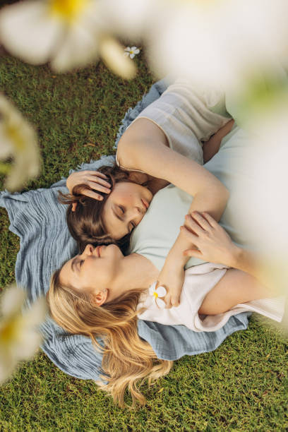 istock Mother and daughter hugging each other 2150378403