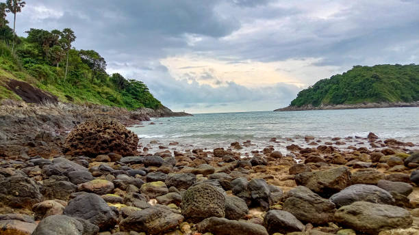 istock seashore with a rocky beach of coral 2150379269