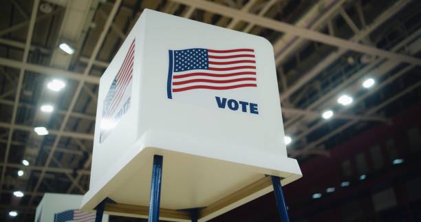 istock Voting booth with American flag logo at polling station 2150380512