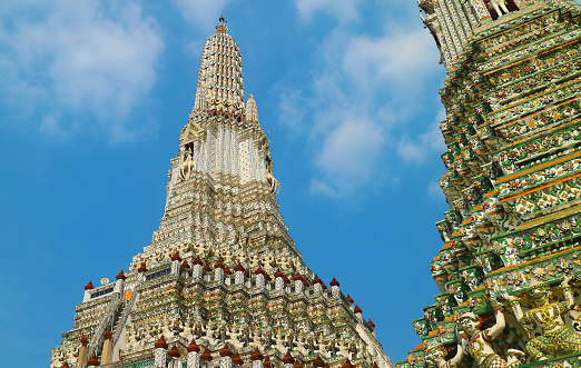 The Central Holy Spires or Phraprang of Temple of The Dawn with Amazing Statue of Indra Riding on Airavata, the Iconic Landmark of Bangkok, Thailand