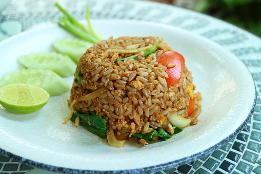 Mouthwatering Freshly Cooked Thai Dish of Khao Pad Moo or Stirred-fried Rice with pork