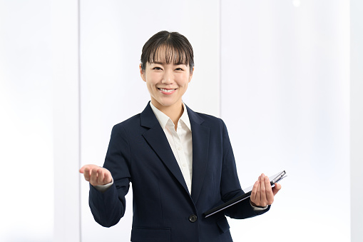 Business woman introducing herself with a smile
