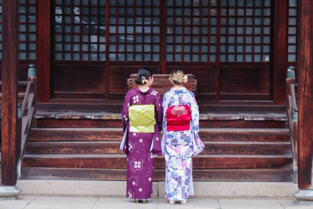 istock Young beautiful women visintg shrine 2150386313