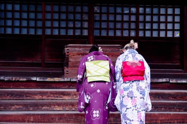 istock Young beautiful women visintg shrine 2150386350