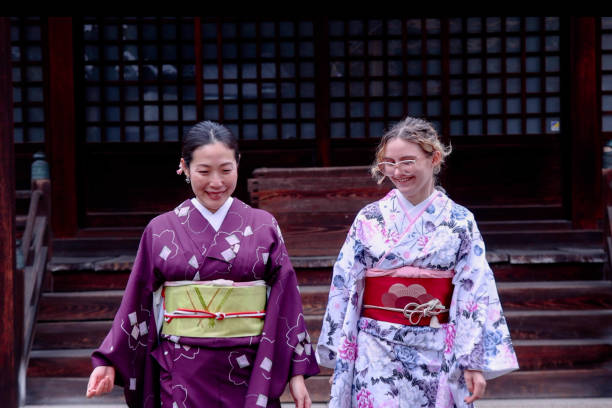 istock Young beautiful women visintg shrine 2150386382