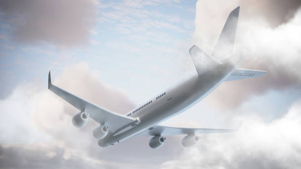 istock Commercial Airplane Flying Through the Cloudy Sky 2150387604