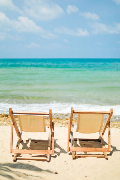 Seaside lounge chairs for tourists on holiday