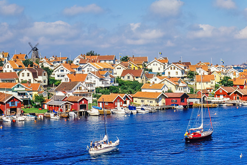 Boats on the sea by a swedish old fishing village