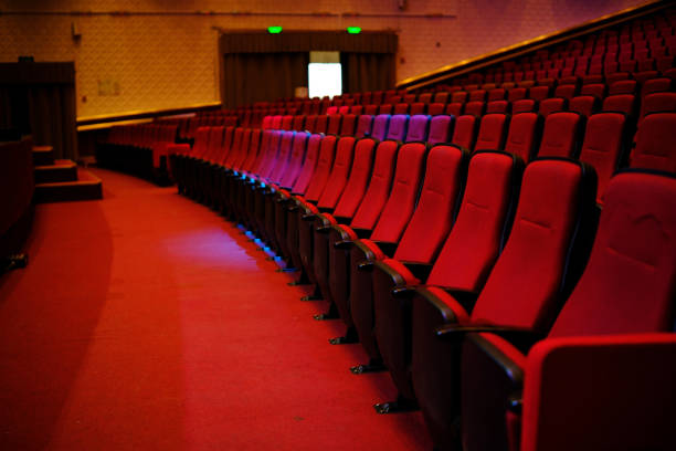 istock Empty hall in the theater. rows of red chairs 2150390667