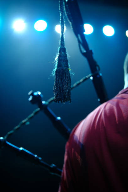 Scotsman artist bagpipes on stage