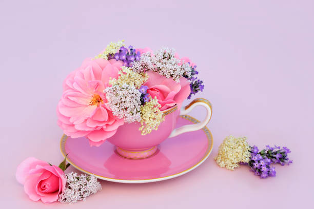 istock Surreal Rose Elder Valerian and Lavender Flower Tea Cup Composition 2150392093