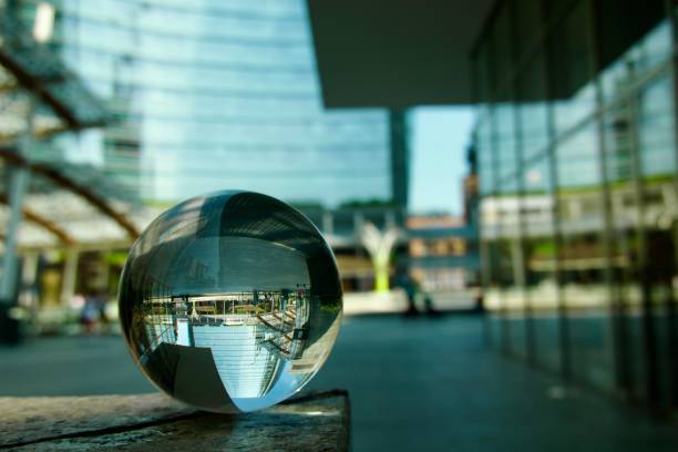istock Crystal ball against skyscrapers 2150393360