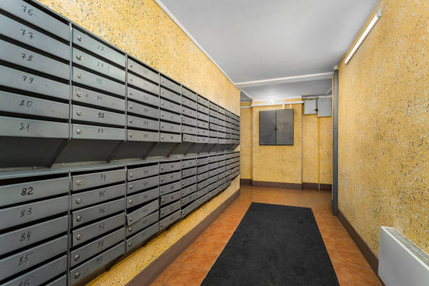 istock Mailboxes in a residential building with apartment numbers. 2150393580