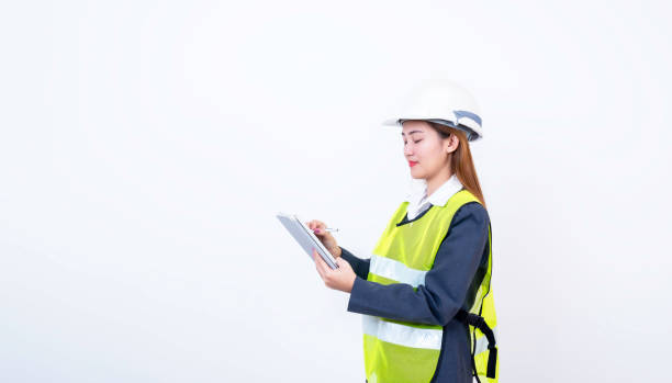 istock Happy woman engineer worker working with digital tablet on white background. 2150394431