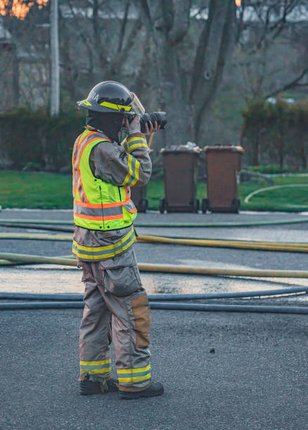 Saint-Hugues, Québec, Canada, April 25 2024 During a fire in Saint-Hugues on the evening of April 25th, firefighters from the municipality as well as neighboring municipalities are battling the blaze. Paramedics and public safety personnel are on site, along with media photographers capturing the scene.