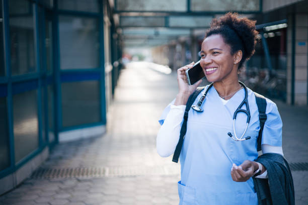 istock Smiling female doctor with afro hairstyle. 2150395942