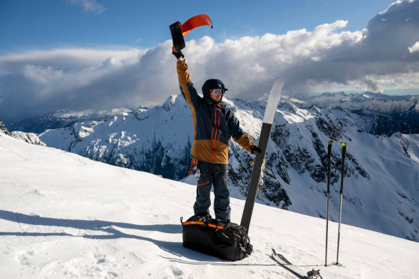istock Backcountry prepares to ski down mountain 2150396632