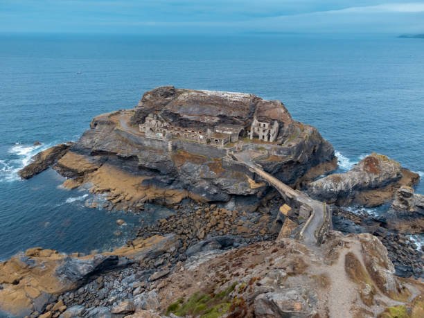 istock Small island with a building or fortification, with daylight. The Fort des Capucins, majestically perched on its rocky islet, in the heart of the Iroise Sea, on the Crozon peninsula, in Roscanvel, France. 2150397220