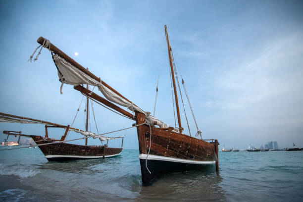 Fishing ships and boats in water of Indian ocean. Zanzibar, Tanzania.