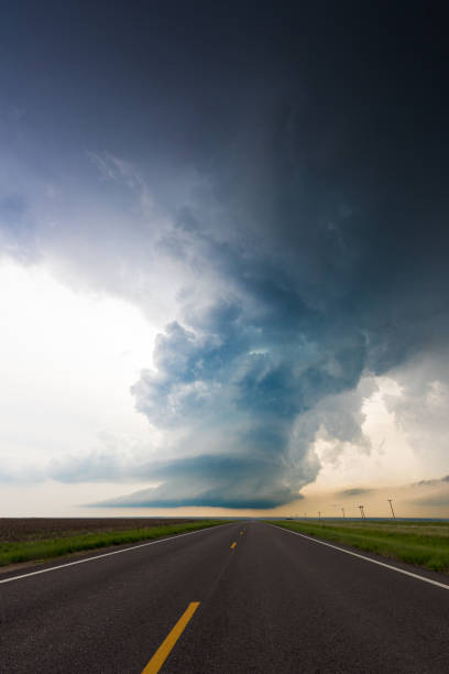 istock Awesome Storm Cloud Looming Over An Empty Road 2150399432