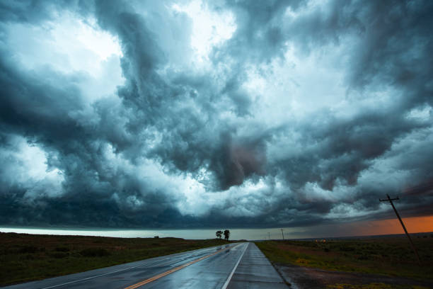 istock Beautiful Cloud Textures And Colors Fill The Sky Above An Empty Road 2150399434