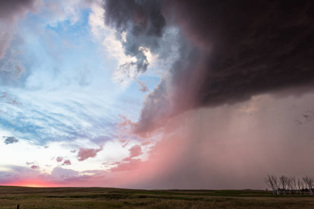istock Pastel Colors Fill The Sky As A Passing Storm Meets The Setting Sun 2150399489