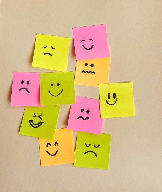 istock Happy and Sad emotions on sticky notes 2150399622