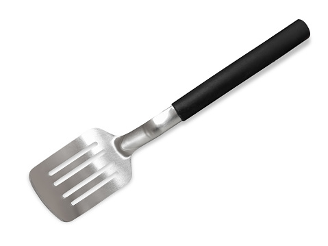 Spatula grill tool, stainless steel barbecue paddle with black handle insulated on white with clipping path included