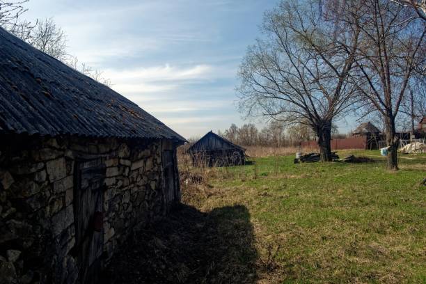 Old buildings in the countryside in spring, Russia